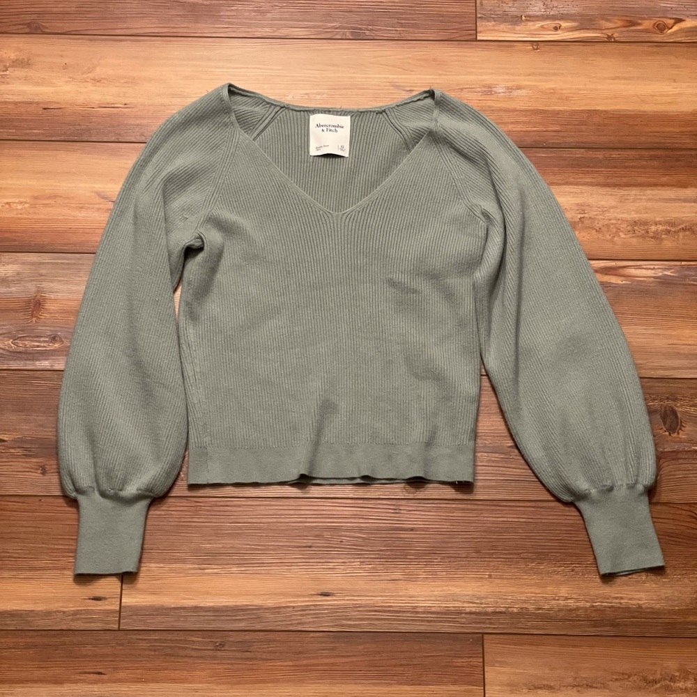 Light blue, bell sleeved shirt